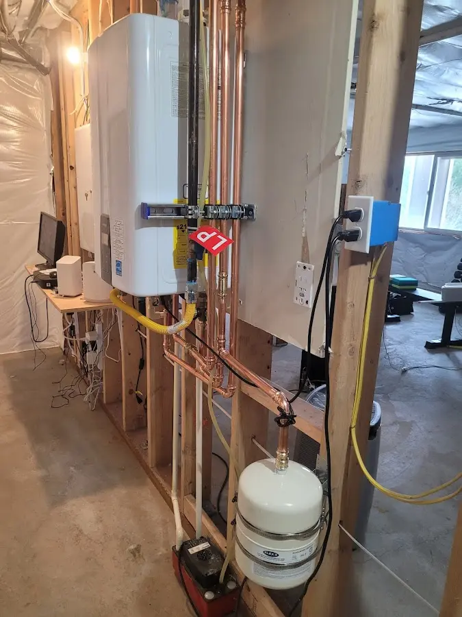 Licensed plumber repairing a kitchen sink in Baxley